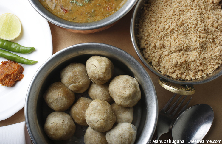 http://www.dreamstime.com/stock-image-top-view-dal-bati-lentil-based-dish-dumplings-cooked-curry-rajasthan-cuisine-served-rice-image38469991